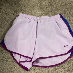 Purple Nike shorts